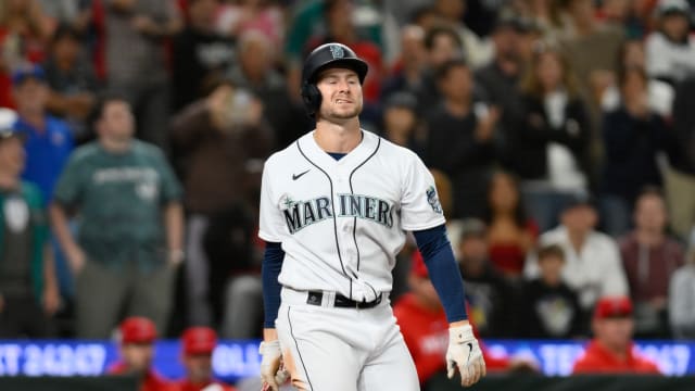 Sep 11, 2023; Seattle, Washington, USA; Seattle Mariners right fielder Jarred Kelenic (10) reacts to striking out against the Los Angeles Angels during the ninth inning at T-Mobile Park. Mandatory Credit: Steven Bisig-USA TODAY Sports  